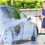 A clean car at a car wash near me paracoche.ovh with water and soap bubbles.